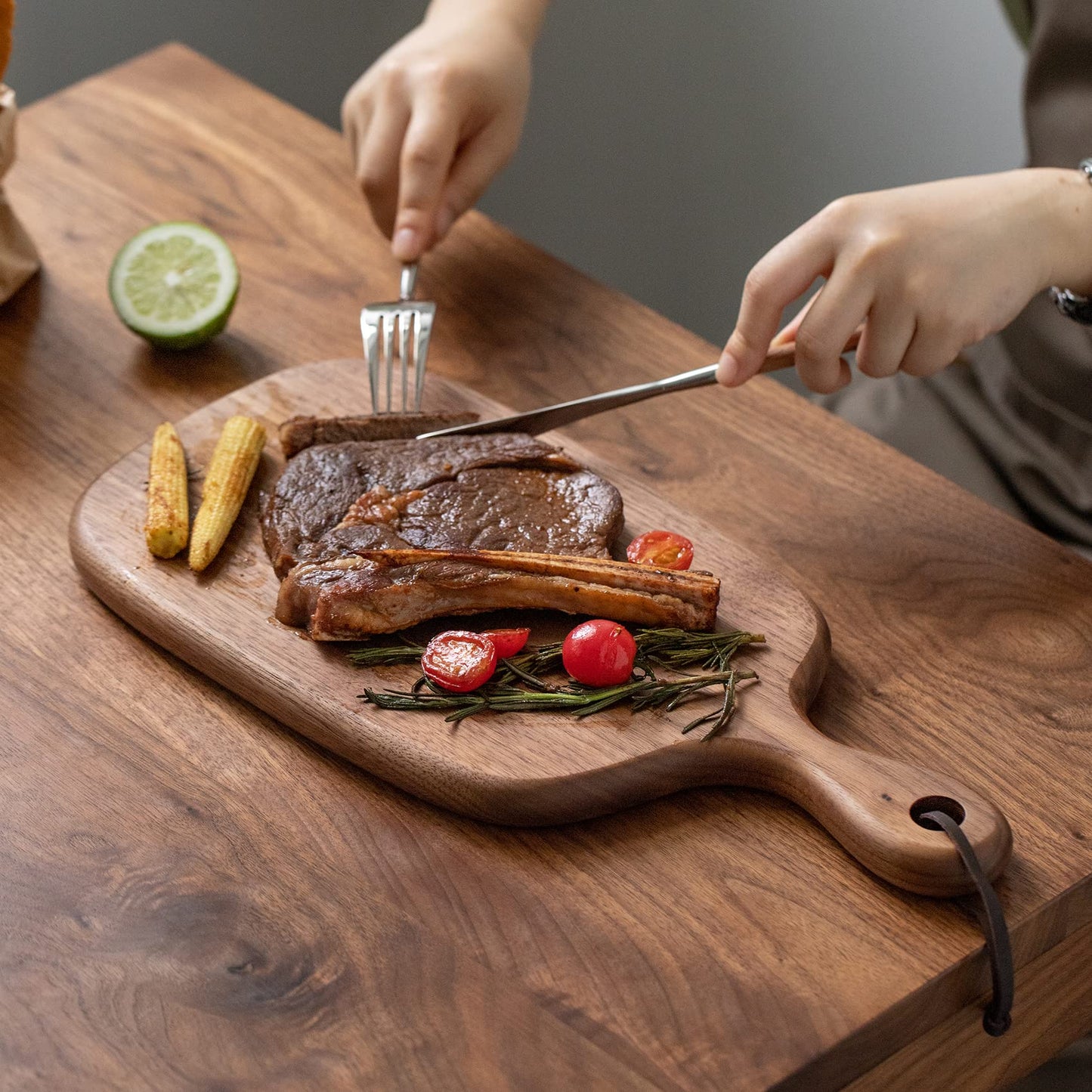 Muso Wood Small Cutting Board with Handle, Walnut Wooden Chopping Boards for Bread, Vegetables & Fruits, Dinner Cheese Board with Hole(15.2x7.3 Inches)